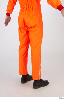 Shawn Jacobs Painter in Orange Covealls A Pose leg lower…